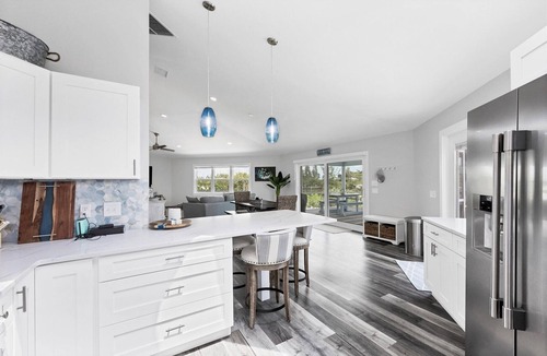 Palm Island House | The Water House - Unique Octagonal Island Home with Heated Pool and Private Dock!