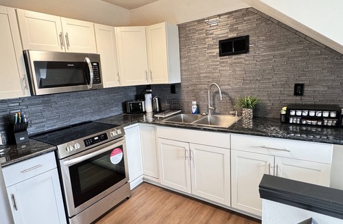 Algiers House | This two-story modern retreat house is the perfect spot to rest and relax.