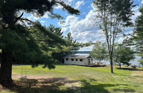 Crystal Falls Cabin | Timber Haven on the water's edge with your own private, sandy beach