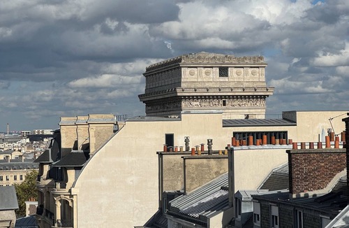 Champs-Elysees Apartment | Top floor Paris studio - view of rooftops and monuments