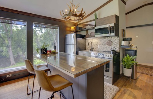 Greater Napanee Apartment | Tranquil/Private King Suite, Cozy, Riverfront w/hot tub,fireplace,firepit,trail.