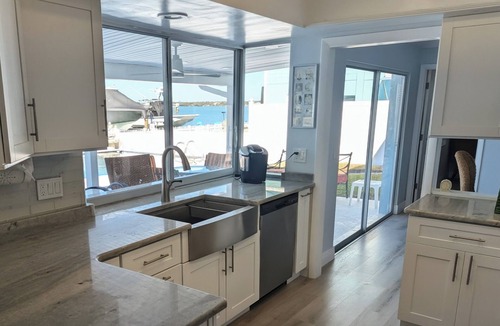 Capri Isle House | Treasure Island Beach Waterfront Pool and Dock Home