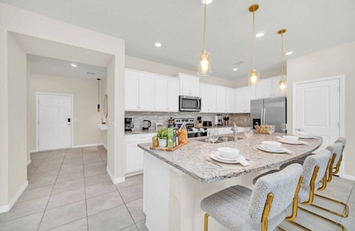Tuscan Hills Villa | Ultimate 5 Bedroom Windsor Island Resort Pool home