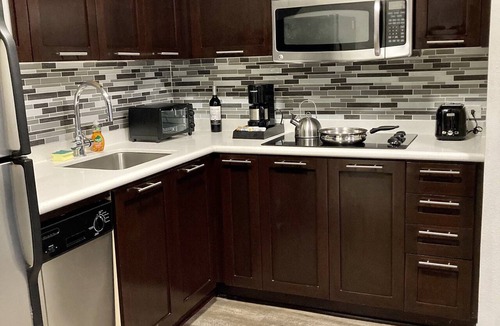 Celebration Apartment | WALK OUT UNIT TO POOL! 2-Bedroom, 2- Bath Corner Suite Minutes from Disney!