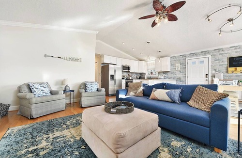 Caine Woods Villa | Walk to the Beach! Firepit, Fully Fenced Yard, Grill, Bikes, N64, Pets/EV!