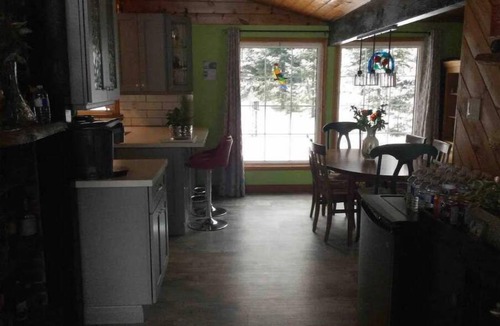 McMurrich/Monteith Cottage | Waterfront Cottage Large deck overlooks the lake