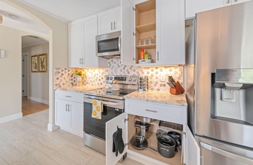 Convair Cove House | Waterfront Home with Heated Pool & Spa | Dock | 4.5 Blocks to Beach & Downtown