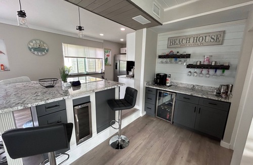 South Island House | WE ARE BACK! NEWER POOL/SPA and Walk to beach! Totally updated Canal front home!