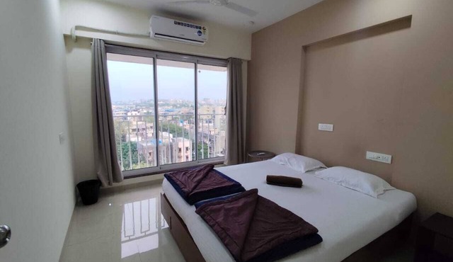 3 BHK Apartment with AC, WiFi, and Rooftop in Santacruz, Mumbai.