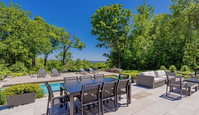 6 bed 6 bath home on 21+ acres! Pool, Hot tub, Putting Green!