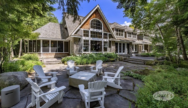 6 bed, 8 bath Beautiful Lake Joe Compound! Sunsets, Boathouse, Sauna & Gym!
