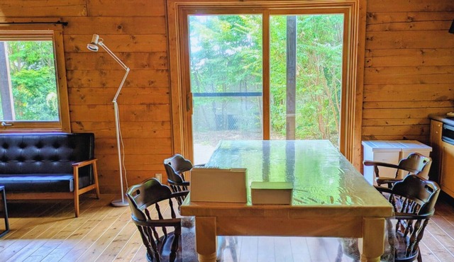 A log cabin vacation rental nestled on a hill in I/Ito City Shizuoka