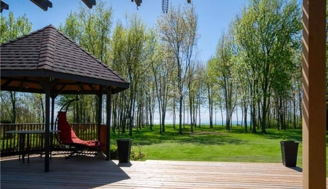 Bluewater Lakehouse Retreat with Private Beach & Hot Tub