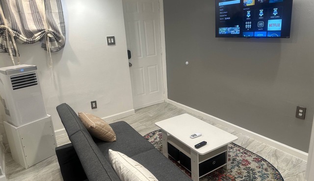 Charming 2-Bedroom Basement Retreat in Uniondale – AC, WiFi & More!