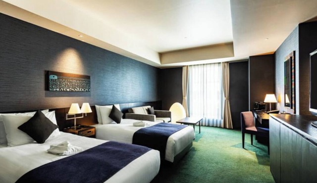 Classy Twin hotel in welcoming Taito City with AC, fitness room, WiFi