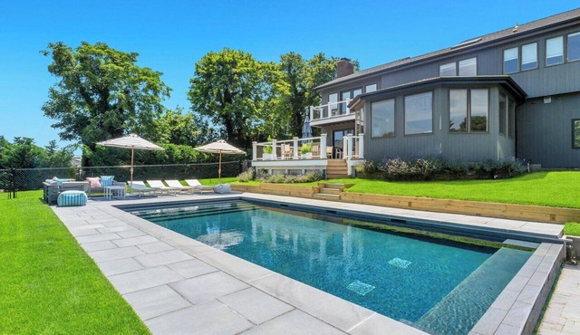 Contemporary Bayfront Retreat with NEW Heated Saltwater Pool, Bluestone.
