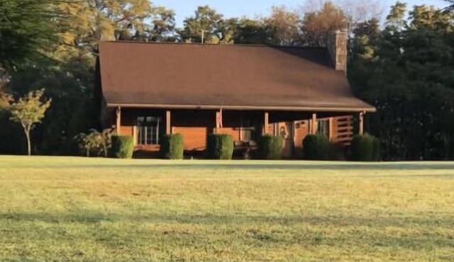 Cooley’s Cottage is a beautiful log home with a hot tub!