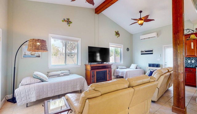Dog-friendly cottage near the beach with patio, grill, washer/dryer, partial AC