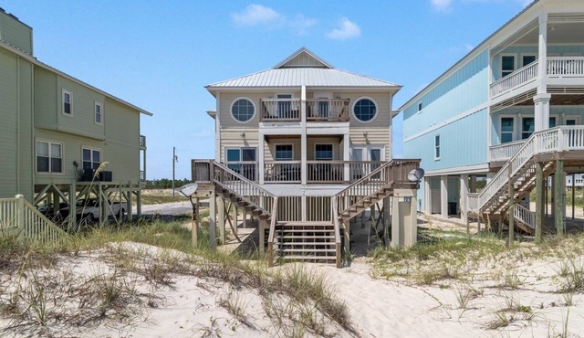 East Side of Updated Gulf Front home with awesome views steps from the beach