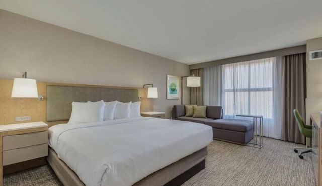 Eco-Certified Guest Room with Heated Pool, On-Site Dining, and Easy I‑10 Access