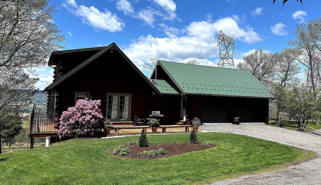 Enjoy a beautiful log cabin overlooking Belleville, PA with stunning views