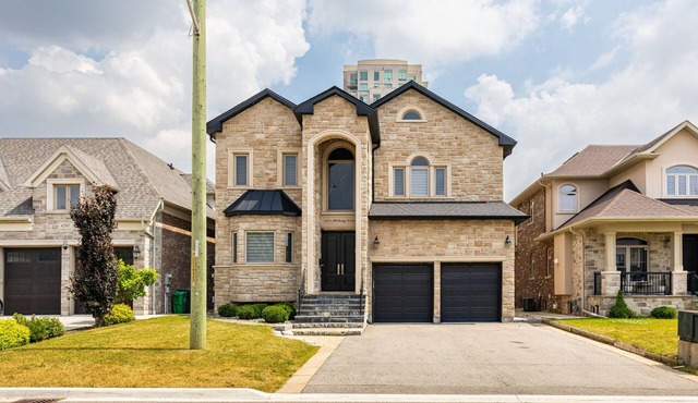Exquisite Custom-Built 5 BDRM Multi-Level Estate