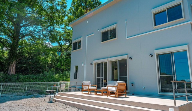 House surrounded by trees with a dog run/Kamogun Shizuoka