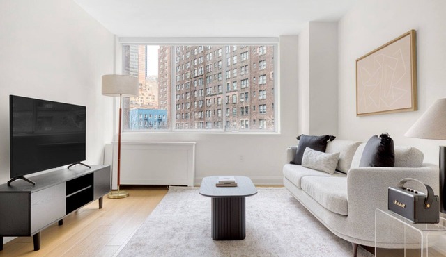 Ideal Midtown East 2BR w/Elevator, Doorman & Gym, near UN, by Blueground