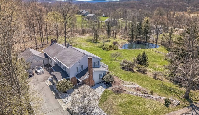 Lovely house with AC in the heart of Goshen there is a spectacular pool