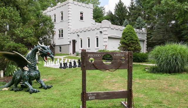 Luxury POCONO CASTLE w/ESCAPE ROOM, Private Pond, Boats, Sauna & Hot Tub