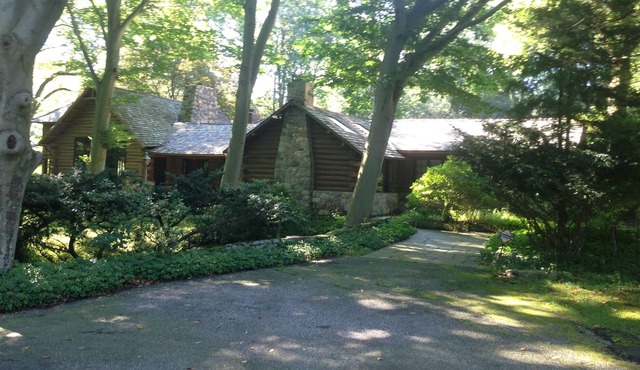 Real log house on Directly on the River with heated pool one hour from NYC.