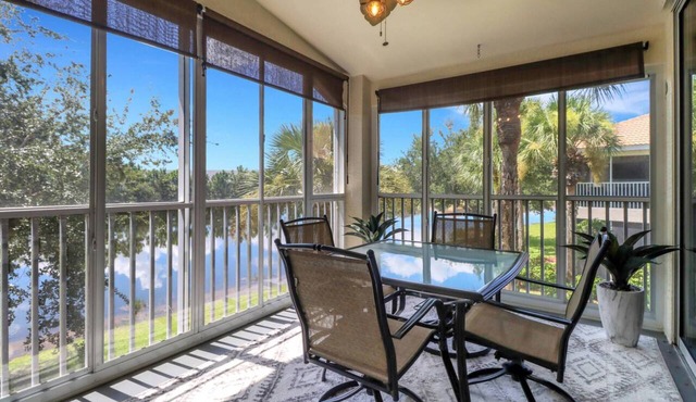 Resort-Style Living Awaits | Beautiful Colonial Country Club Condo with Water Views & Bikes Included