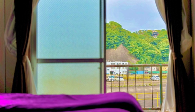 Retro Romantic Room! Private rooftop room with a view of Tokyo Bay beyond the Uraga Dock.