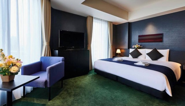 Scenic King hotel with AC, WiFi in vibrant Taito City