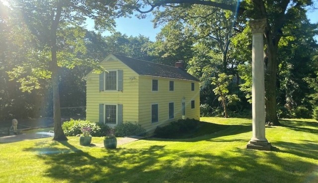 Secluded, private woodland cottage with two bedrooms and stone patio for summer!