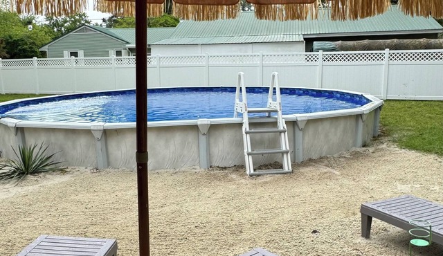Spacious home with private pool & game room. Sleeps 15. Close to Ocean City.