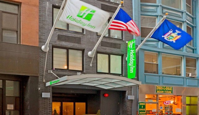 Steps from Wall Street + Fitness Room & Wi-Fi