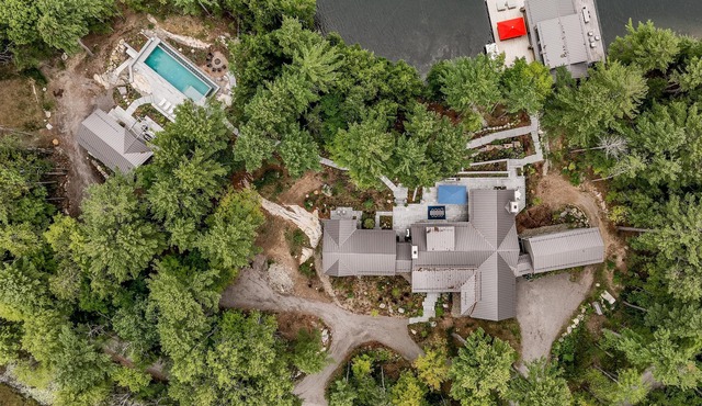 Stunning Estate with Pool House & Boathouse Accommodations! Central Lake Joe!