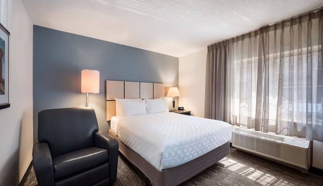 Stylish Queen Studio Suite with Workspace & Full Kitchen