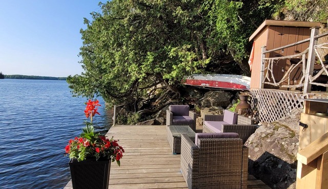 Two bedrooms and a loft with a bunkie on side lakefront cottage on Bobs Lake