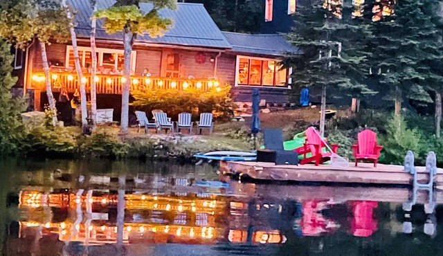 Updated historic log cabin on the lake, w/amenities enough for 2 families