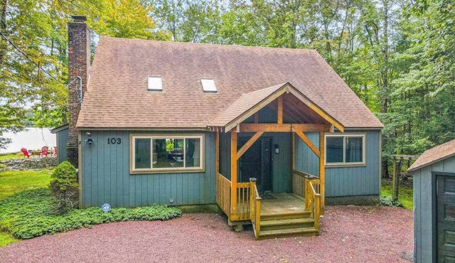 Woodland Cabin with Firepit Pools and Lake Beach