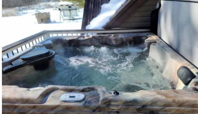 Your summer getaway- with a hot tub!