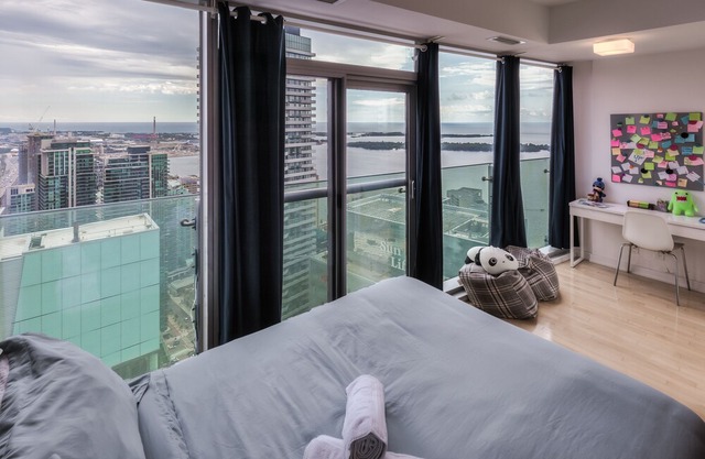50th+ floor lake view condo beside CN tower