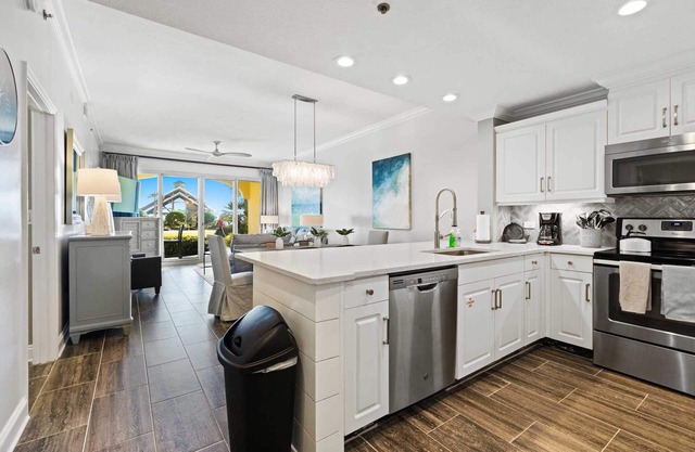 Modern Upscale Condo Ground floor with easy beach access. Beach Service included $60 day Value!