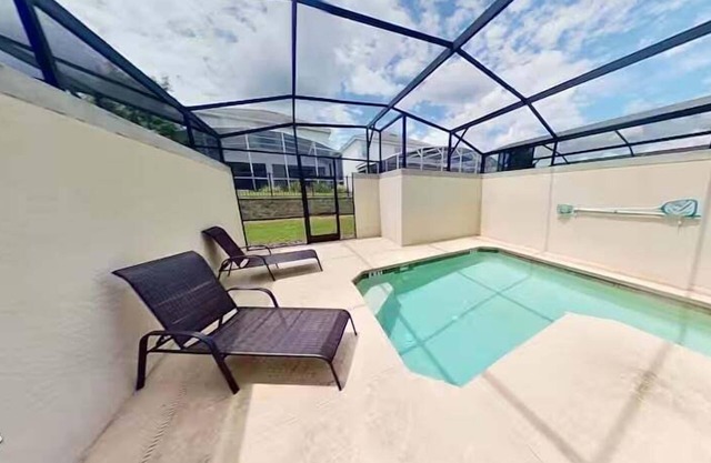 Poolside Bliss: Enchanted 4BR Townhome, Ultimate Fun! - 1556