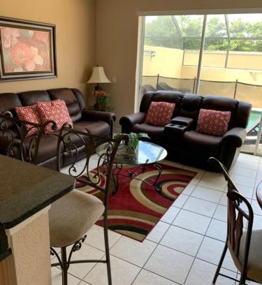 Windsor Hills House | 3 BR 2 Miles to Disney, pool, free WiFi and more townhouse