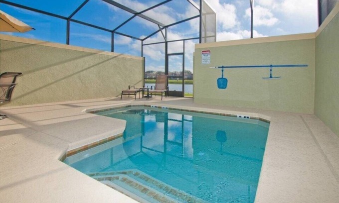 West Kissimmee House | BEAUTIFUL LAKE FRONT TOWNHOME ONLY STEPS FROM THE CLUBHOUSE! HARRY POTTER AND BRAVE KIDS THEME ROOM!
