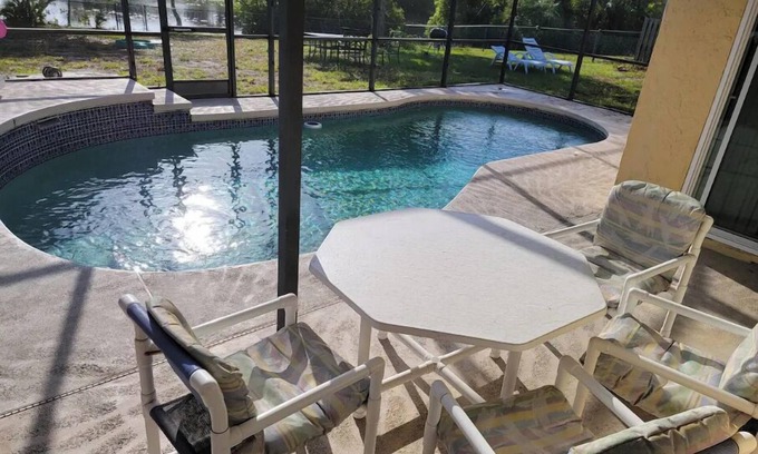 Indian Wells House | Cozy lake house with private heated pool near Disney