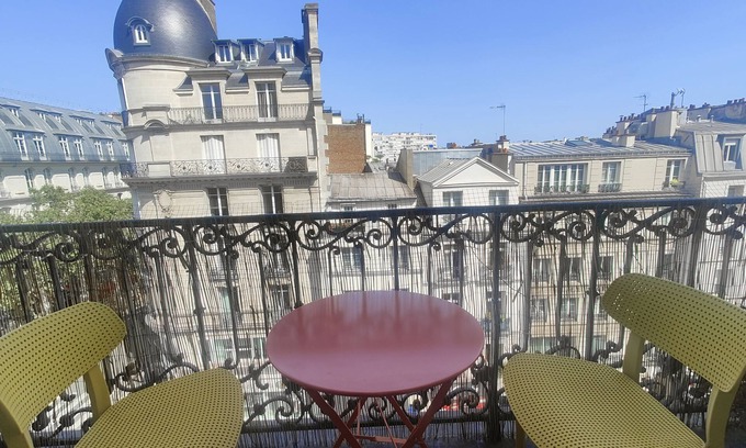 Quartier de la Roquette Apartment | Haussmann-style apartment with balcony, next to Place de la Bastille.